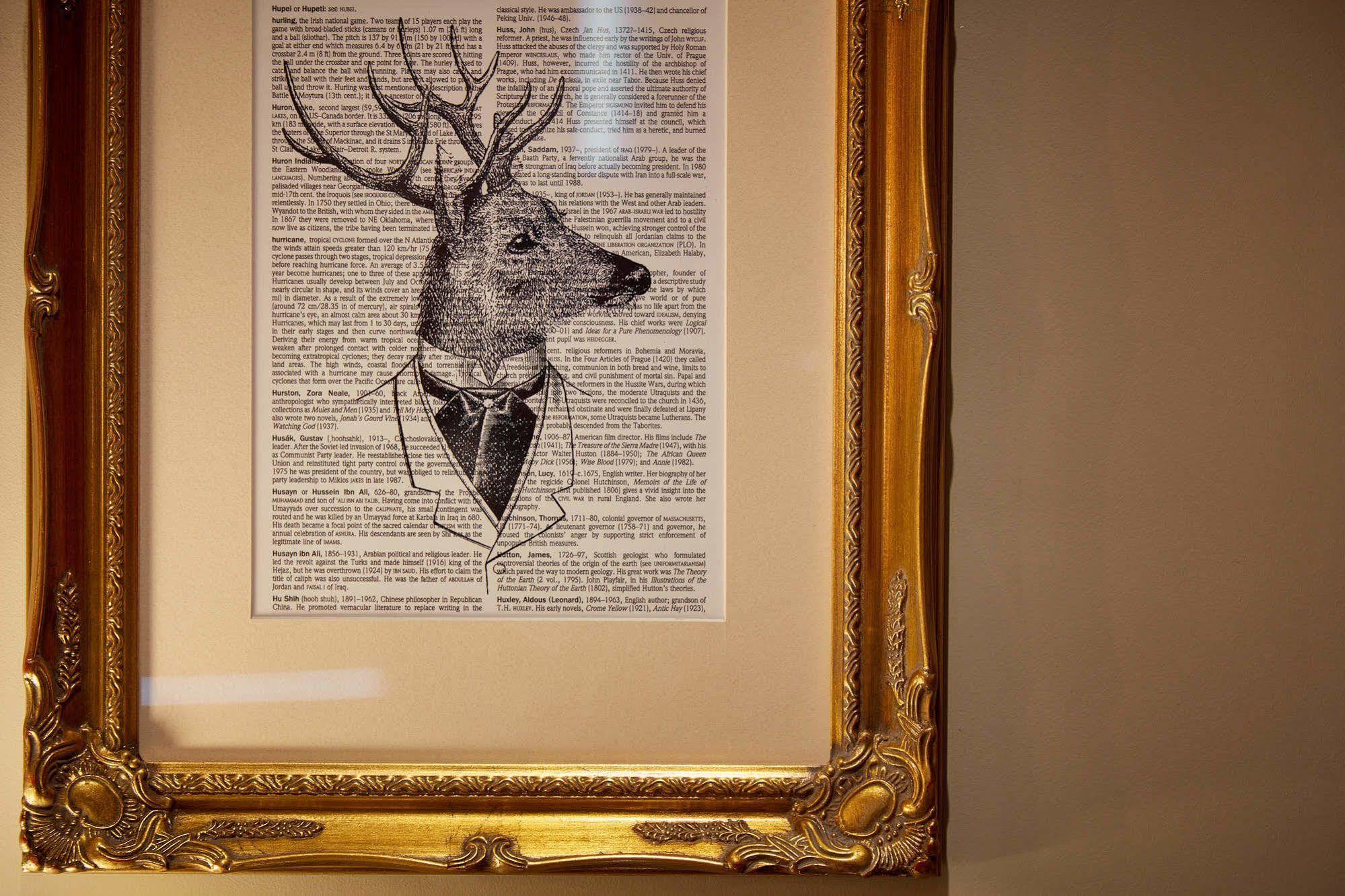 Oddfellows On The Park Cheadle  Zewnętrze zdjęcie A framed print of a deer head with a bow tie